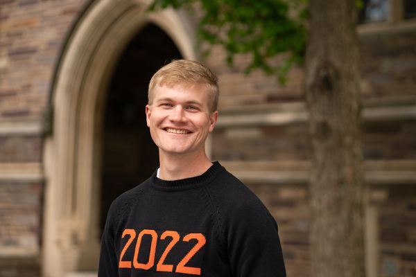 The author happy to finally graduate college